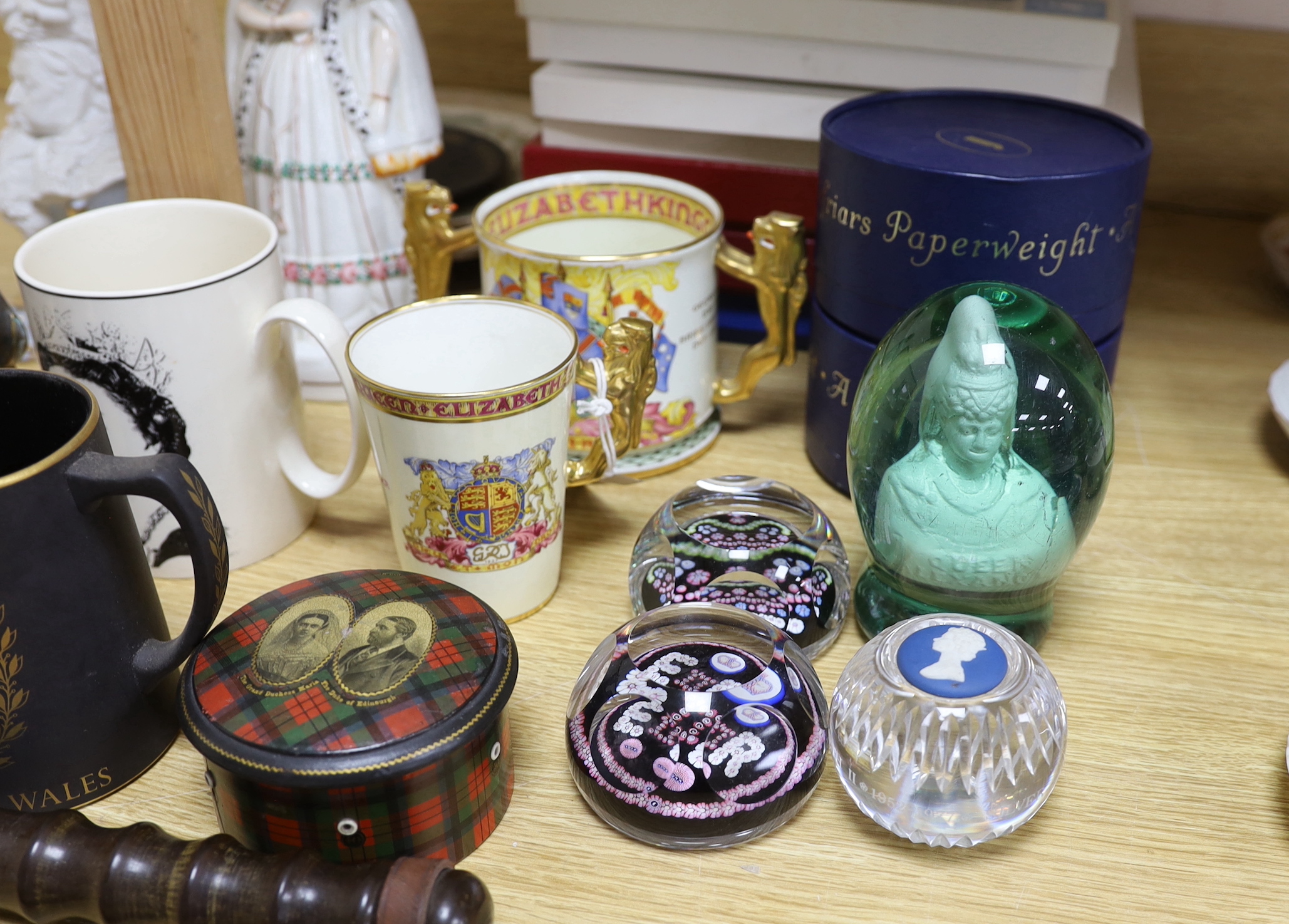 A collection of principally Victorian and later commemorative wares to include a pair of Wedgwood porcelain armorial beasts, glass paperweights etc together with a constabulary truncheon, the largest 39cm in length